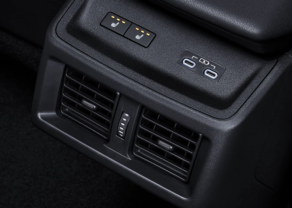 bZ4X: Rear air vents with additional airflow from under-seat and seat-back outlets, plus two USB Type-C charging ports for rear passengers